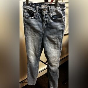 Good American Light to medium indigo with fading through the thighs.